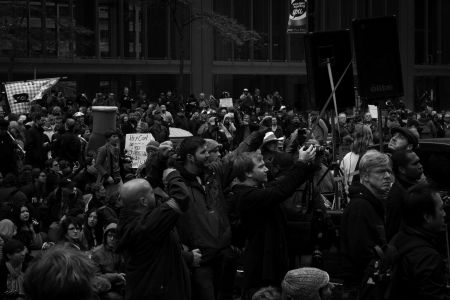 Thousands gather at the corner of King and York Streets in downtown Toronto, Ontario.