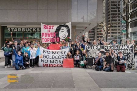 The march began with the crowd gathering at Goldcorp’s Toronto office on 130 Adelaide Street for a memorial for Topacio Reynoso Pacheco. This 16 year old mining resistance activist was murdered a year ago for her resistance to the Escobal mining project, jointly owned by Goldcorp and Tahoe Resources.