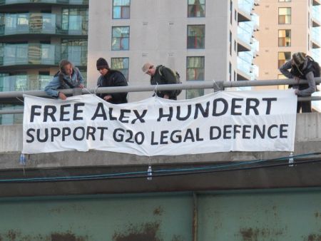 A drop by environmental justice activists in solidarity with Alex Hundert and other G20 prisoners while he was being held on 'bail violations'
