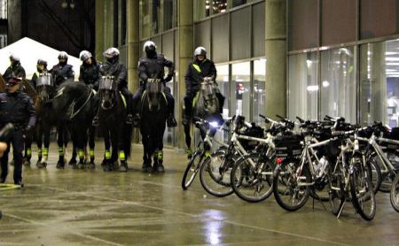 Riot police on horseback outside City Hall photo: Loretta Lime