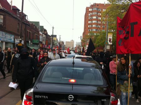 The march takes over all of Dundas on its way to Alexandra Park.  Photo by Krystalline from Rabble.