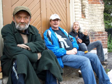 Nipper, Brian DuBourdieu and Sam Ash sit on the church steps at Dundas and Sherbourne on Friday, Oct. 4, 2013. 