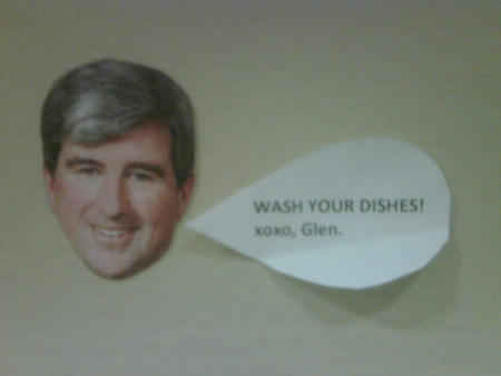 A photo form inside the occupation of a sign in Glen Murray's office urging staff to do dishes.