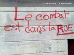 Photo of graffiti outside the CLASSE office during the student strike, text reads "The fight is on the streets" (Megan Kinch)