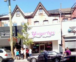 Cabbagetown residents discuss the situation outside of Yogurtys.