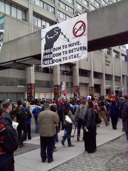 Banner drop at Nathan Phillips Square.  Photo by Megan Kinch.