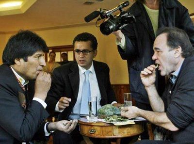 Evo Morales, President of Bolivia and former union leader of coca workers, passes on some of his expertise to Oliver Stone 