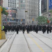 More cops 1 block east at Yonge St. and College St. (1/2 block east of Toronto police headquarters) 