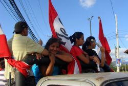Nov. 30, 2009 - The day after millions of Hondurans refused to participate in sham elections, hundreds took to the streets in a caravan that snaked through the colonias and barrios of the capital city.  The caravan stretched further than the eye could see, horns were honking, people were cheering and flags were flying.