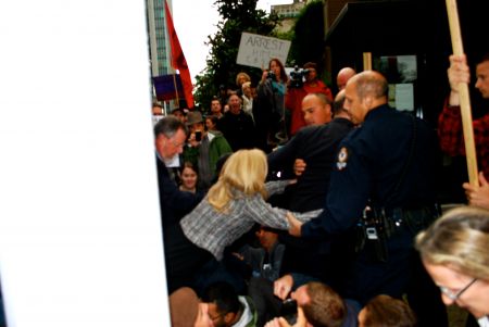 Attempts to cross protest line into back door of the 'Vancouver Club'
