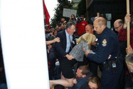 Attempts to cross protest line into back door of the 'Vancouver Club'