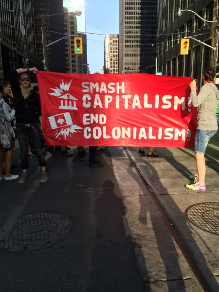 "Smash capitalism. End colonialism" [Credit: Iris Robin]