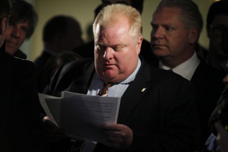 Ford flanked by a few members of his inner circle. Photo Courtesy of The Torontoist