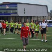 Diana Matheson leading the athletes out